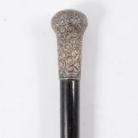 A silver top ebonised cane, scroll design...