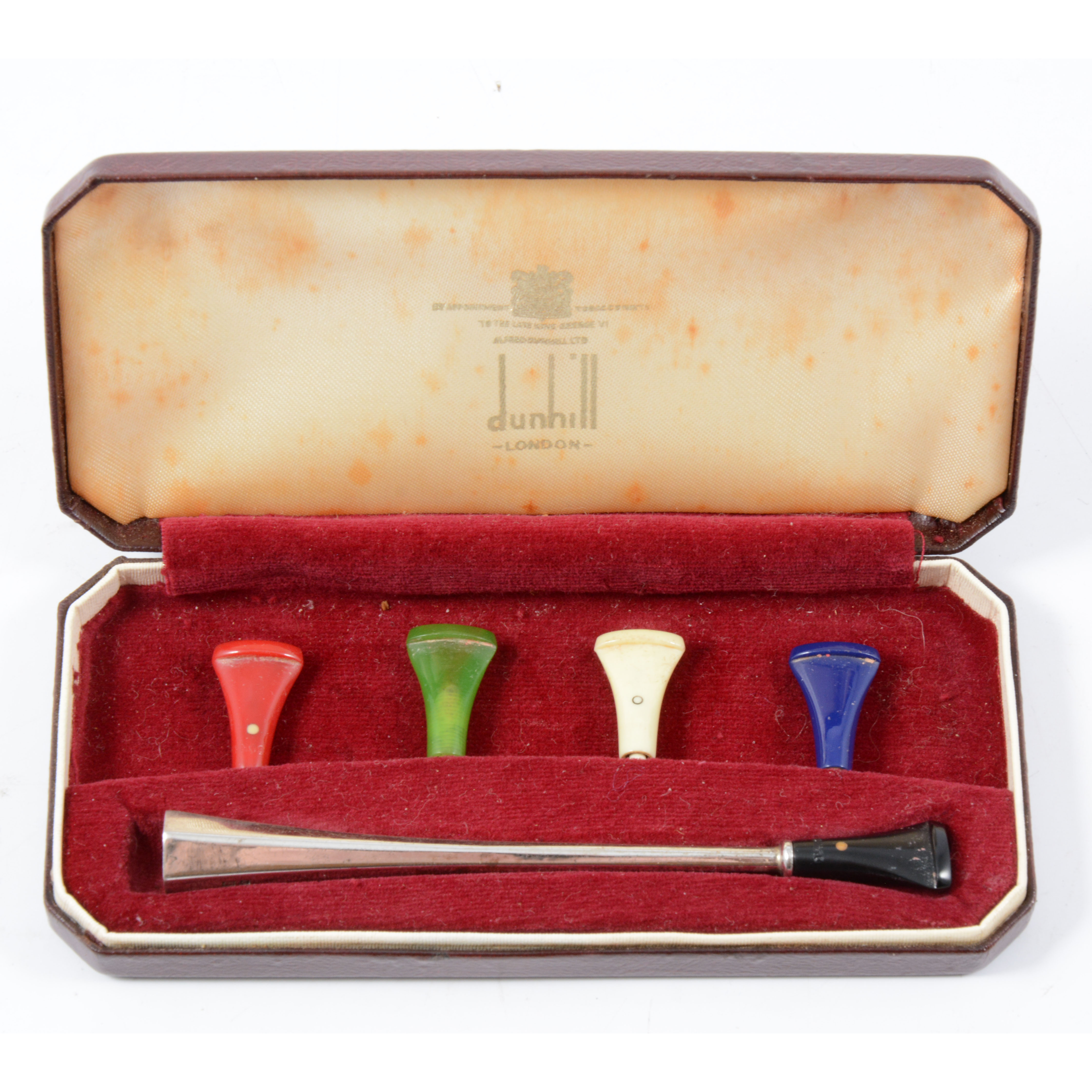 Dunhill - a cased set of cigarette holders, a...