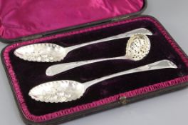 A cased pair of George III silver Old English pattern "berry" spoons, by Peter & William Bateman and