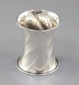 A George V Arts & Crafts planished silver waisted napkin ring, by Omar Ramsden, hallmarked London