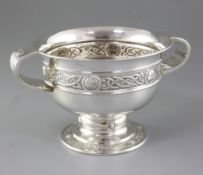 A George V Arts & Crafts silver rose bowl, hallmarked Birmingham 1935, makers mark of LR, of
