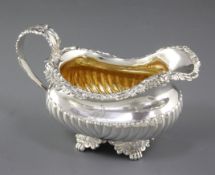 A George III demi fluted silver cream jug, by Joseph Angell I, hallmarked London 1819, of oblong