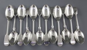 A set of twelve late Victorian silver fiddle pattern dessert spoons, by John Round, hallmarked