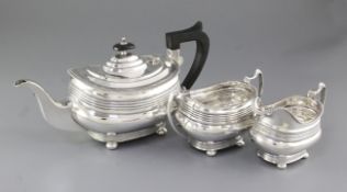 A 1940's silver three piece tea set, by William Bush & Sons, hallmarked Sheffield 1942,
