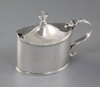 A George III silver mustard pot, by William Abdy, hallmarked London 1801, of oval form, with