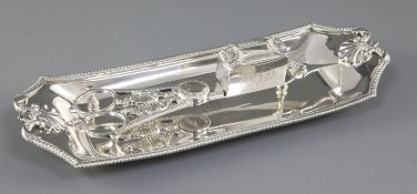 A pair of George III silver candle snuffers and similar tray, the tray hallmarked London 1809,