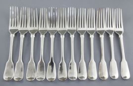 A set of twelve George IV silver fiddle pattern table forks, hallmarked London 1827, maker William