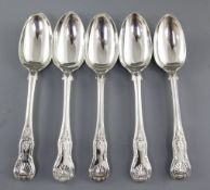 A matched set of five George IV & Victorian silver King's pattern serving/table spoons, hallmarked