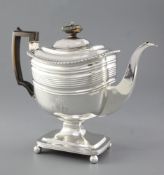 A George III silver pedestal coffee pot, by William Bennett, hallmarked London 1811, with rounded