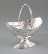 A Victorian silver oval boat shaped sugar basket, by John Newton Mappin, hallmarked London 1882,