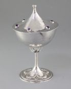 A good Edwardian Arts & Crafts gem set planished silver cup and cover, by Guild of Handicrafts
