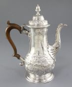 A late George II silver coffee pot, by Robin Albin Cox, hallmarked London 1759, of baluster shape,