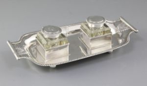 A late Victorian silver inkstand, by Martin, Hall & Co, hallmarked Sheffield 1892, of rectangular