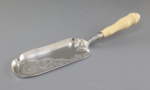 An Edwardian ivory handled silver crumb scoop, by Barker Brothers, hallmarked for Chester 1908, with
