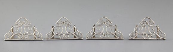 A set of four silver Art Nouveau folding design menu holders, by Lawrence Emanuel, hallmarked