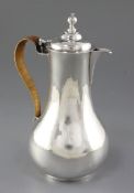 An Irish George III silver hot water pot, maker probably William Thompson, hallmarked Dublin 1785,