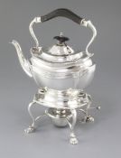 A George V silver tea kettle on stand with burner, by Barker Brothers, hallmarked Chester 1910, of