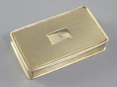 A William IV engine turned silver gilt snuff box, by Nathaniel Mills, hallmarked Birmingham 1830, of