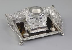 A good Edwardian silver and tortoiseshell inkstand, by William Comyns, hallmarked London 1902, the