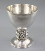 A good 1930's Arts & Crafts planished silver goblet, by Omar Ramsden, hallmarked London 1937, of