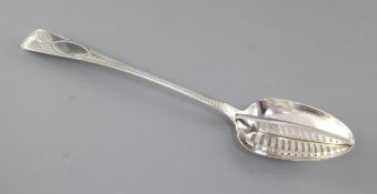 A large George IV Irish silver strainer spoon, by Samuel Neville, hallmarked Dublin 1822, with