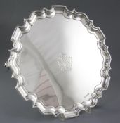 A George V silver salver, by Walker & Hall, hallmarked Sheffield 1916, of circular form with