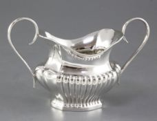 An Edwardian demi fluted silver sugar bowl, by Joseph Gloster Ltd, hallmarked for Birmingham 1904,