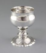 A good George V Arts & Crafts silver goblet, by Omar Ramsden, hallmarked London 1929, of baluster