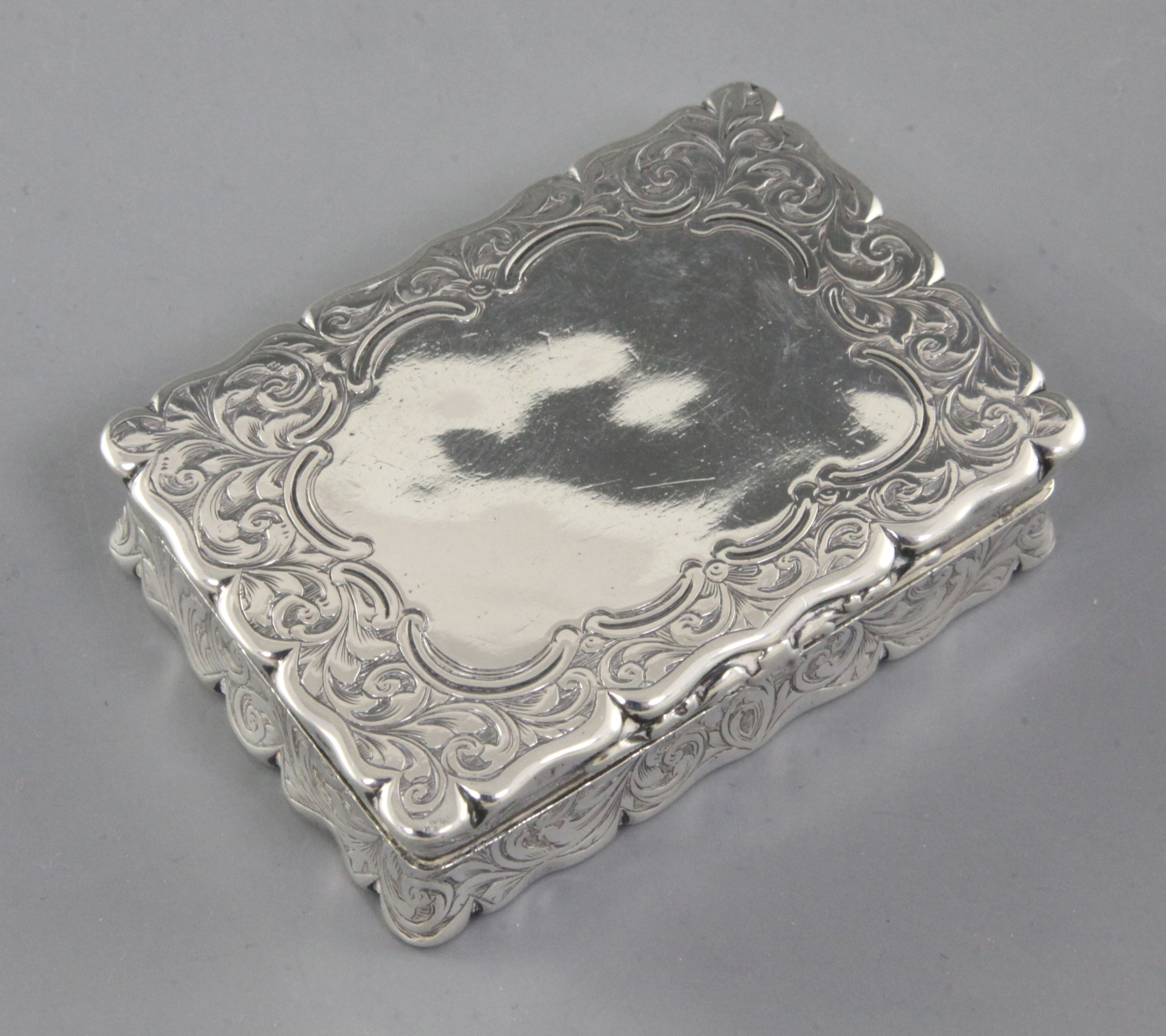 A Victorian silver snuff box, by Edward Smith, hallmarked Birmingham 1860, of shaped rectangular