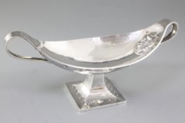 A George V Arts & Crafts planished silver navette shaped two handled dish, by Albert Edward Jones,
