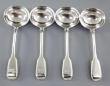 A set of four Victorian silver fiddle pattern sauce ladles, by Elizabeth Eaton, hallmarked London