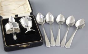 A set of five silver Old English pattern grapefruit spoons, hallmarked for Birmingham 1954 and