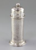 A George V Arts & Crafts silver sugar caster, by Albert Edward Jones, hallmarked Chester 1922, of