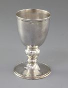 A George V Arts & Crafts silver goblet, by Omar Ramsden, hallmarked London 1920, the urn shaped spot