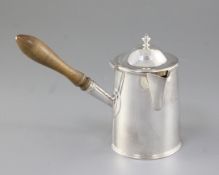 A George V Arts & Crafts silver hot milk jug, by Henry George Murphy, hallmarked London 1934, of