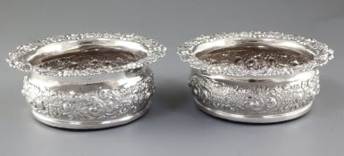 A large pair of George IV silver wine coasters, by John & Thomas Settle, hallmarked Sheffield