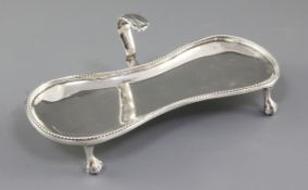 A George III silver snuffers stand, by John Arnell, hallmarked London 1775, of waisted form with