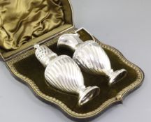 A cased Edwardian silver strawberry pair by Josiah Williams & Co, hallmarked London 1903/4,