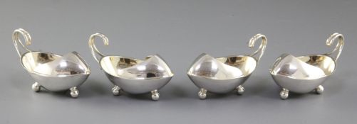 A unusual set of four Edwardian silver salts, hallmarked for Sheffield 1909, Atkin Bros, of boat