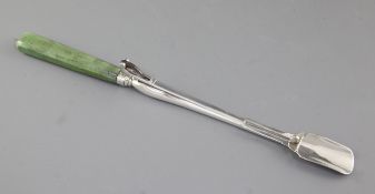 A late George III silver stilton scoop, possibly by John Jackson III, with pusher mechanism and