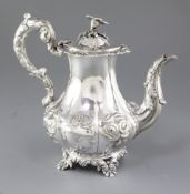 A Victorian Irish silver coffee pot, by J. Mahony, hallmarked Dublin 1868, of baluster form, with