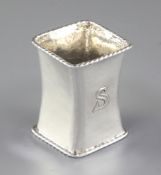A George V Arts & Crafts planished silver waisted napkin ring, by Omar Ramsden, hallmarked London
