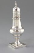 A George III sterling silver caster, by Peter & Ann Bateman, London 1798, of baluster form, on a