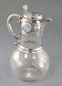 A Victorian silver mounted glass claret jug, hallmarked Sheffield 1864, makers W & G Sissons, the