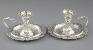 A nice pair of Victorian silver ornate pierced chamber sticks, by Mappin & Webb, hallmarked London
