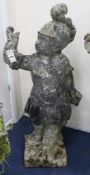 A pair of weathered composition garden statues modelled as putti dressed as Roman soldiers, H.3ft