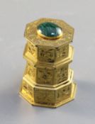 A gilt metal inkwell, c.1840, scroll engraved, of layered hexagonal form surmounted by an oval