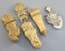 A group of three gilt metal etuis and a parcel gilt silver and ivory pendant notebook, cover various