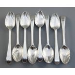 A harlequin set of eight George III silver feather edge pattern teaspoons, with scallop bowls and