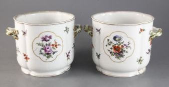 A pair of Dresden porcelain quatrefoil shaped jardinieres decorated with flowers Height 6in.
